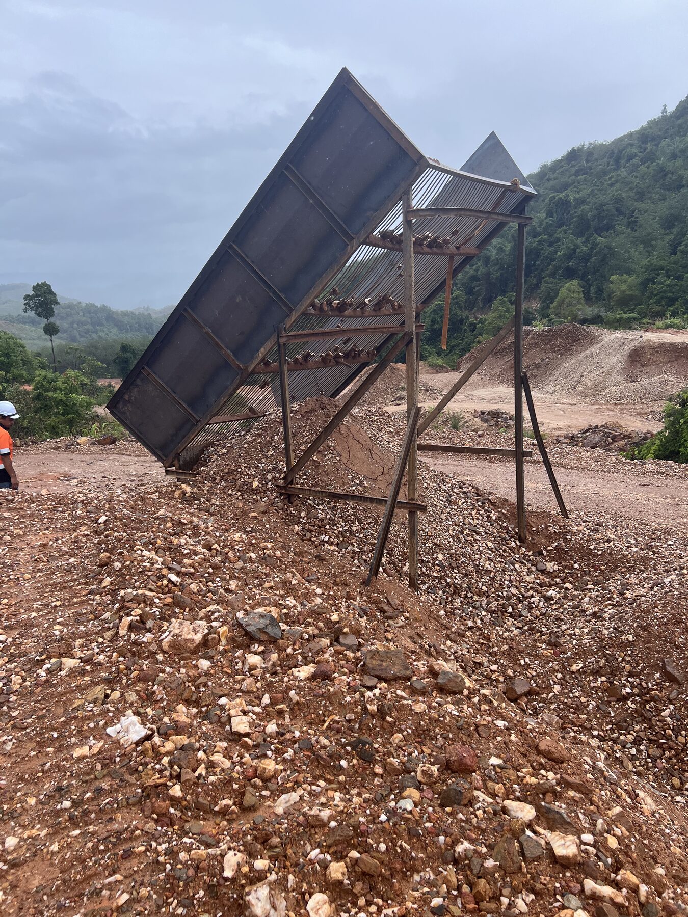 On-site tin ore processing sluice and gravity separation rig at Bukit Kachi mining area, Malaysia.